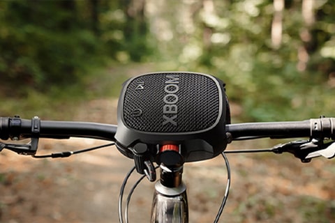 Imagem do XG2T preso na bicicleta.